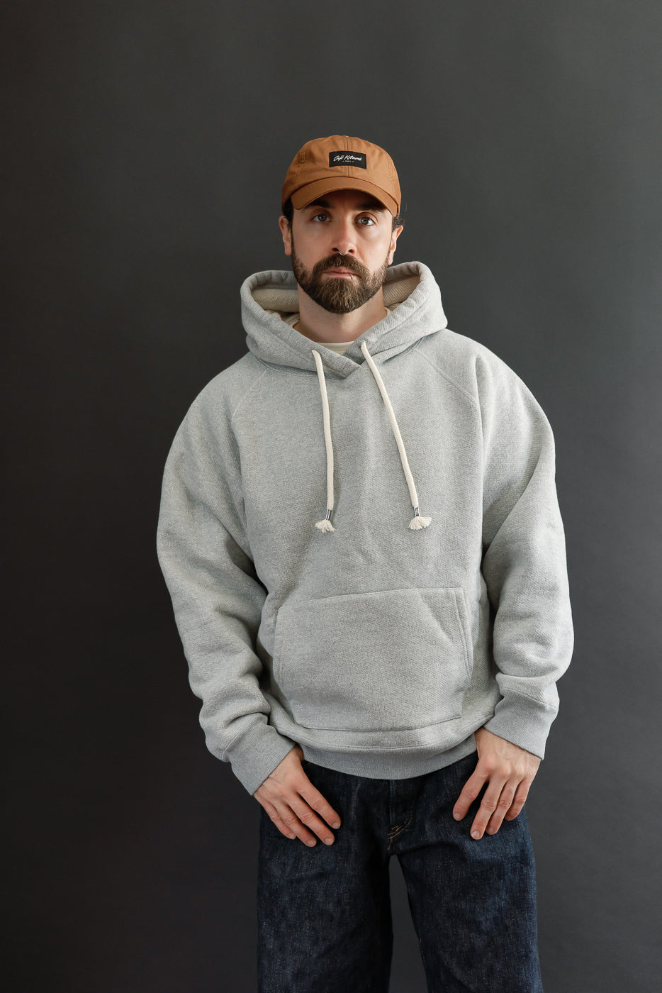 Full body front view of a male model, 5'9