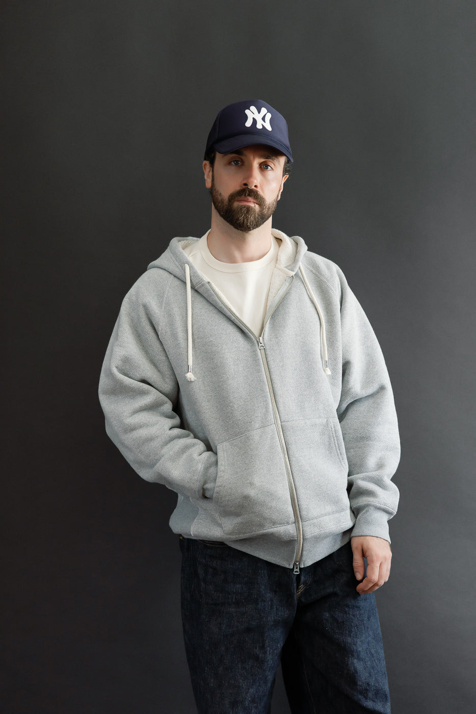 Full body front view of a male model, 5'9