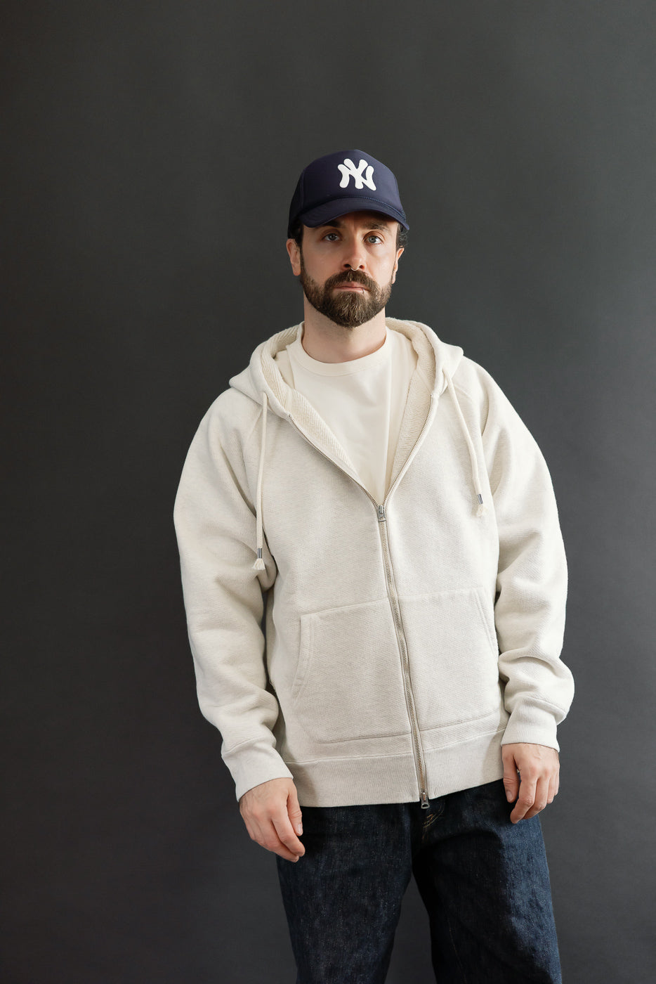 Full body front view of a male model, 5'9