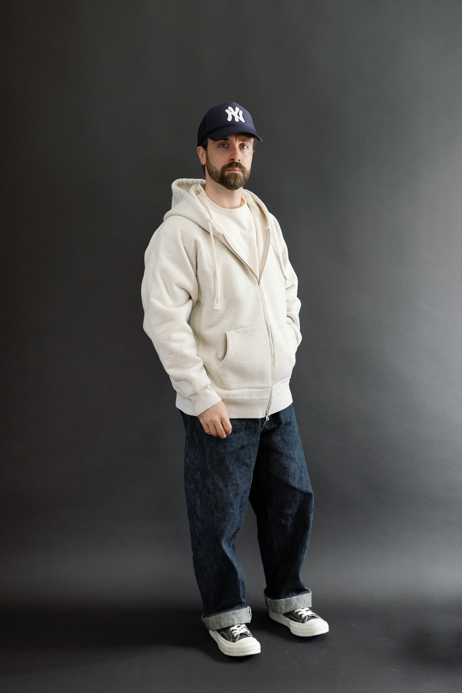 Full body front view of a male model, 5'9