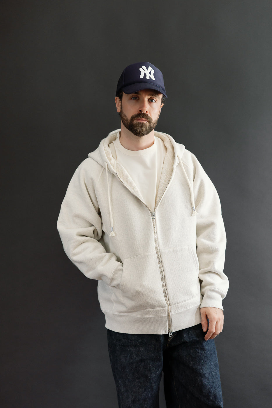 Full body front view of a male model, 5'9