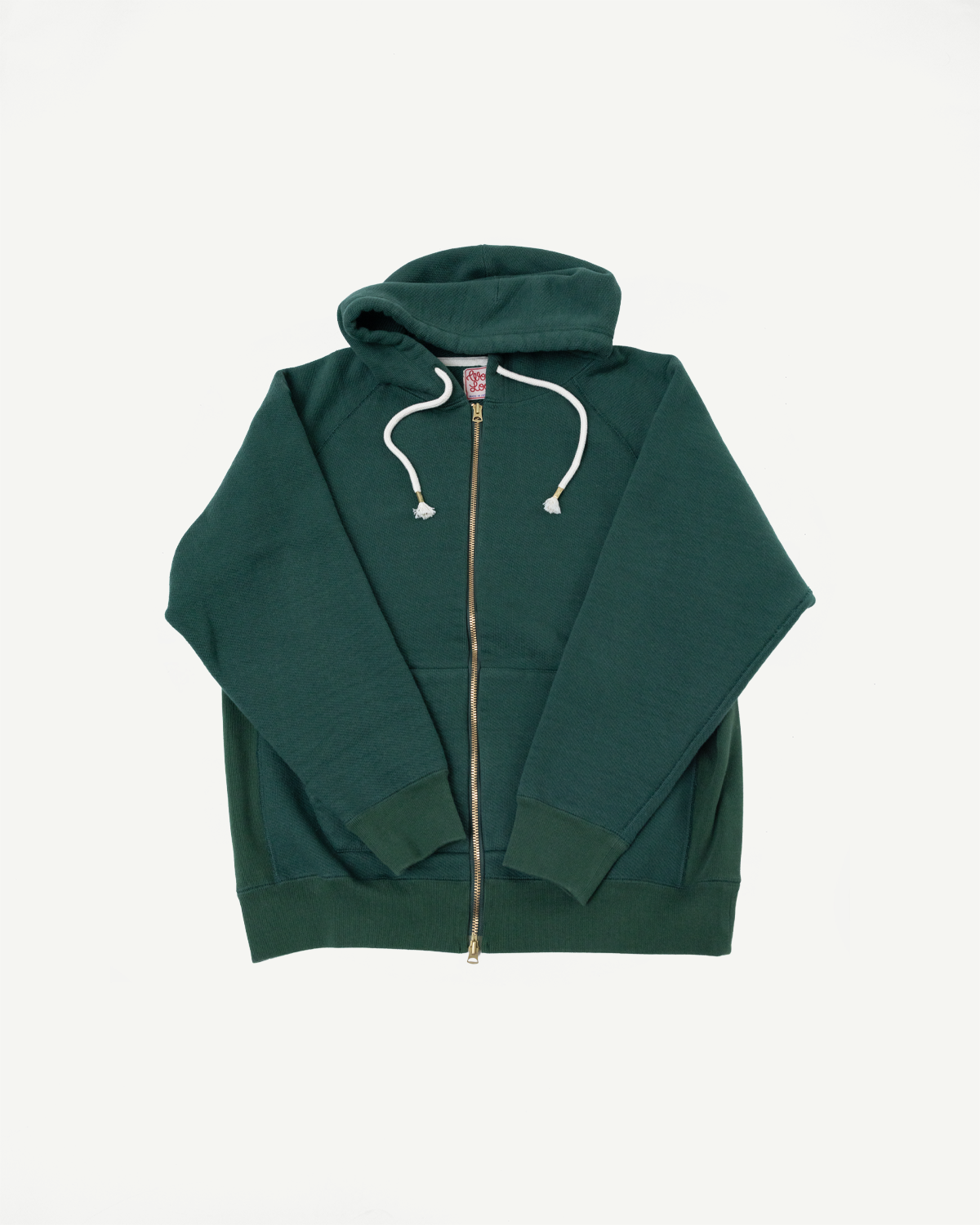 Front view flat lay of a dark green zip-up hoodie with white drawstrings.