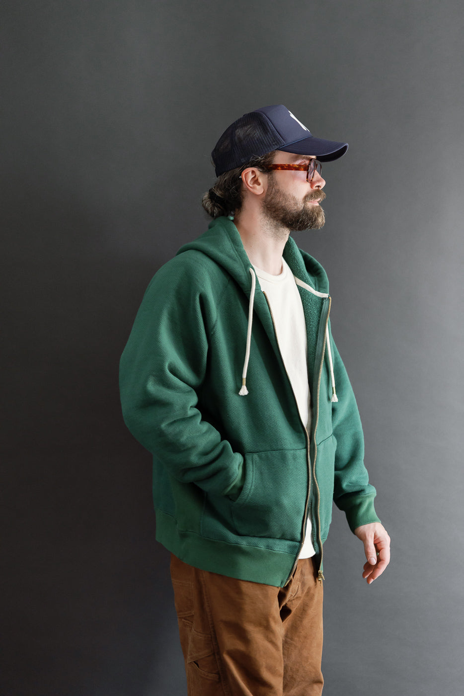 Full body side view of a male model, 5'9