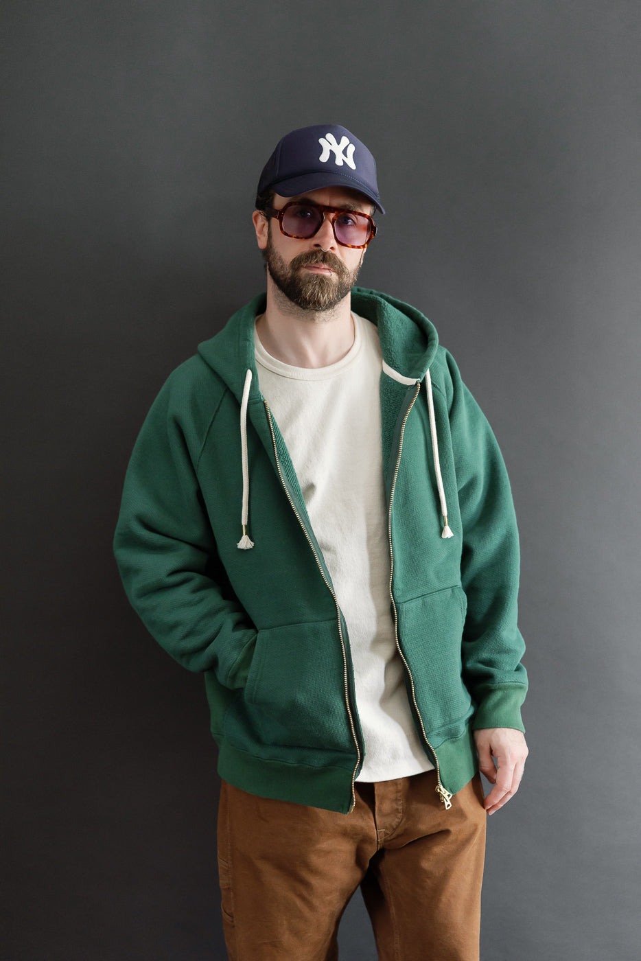 Full body front view of a male model, 5'9