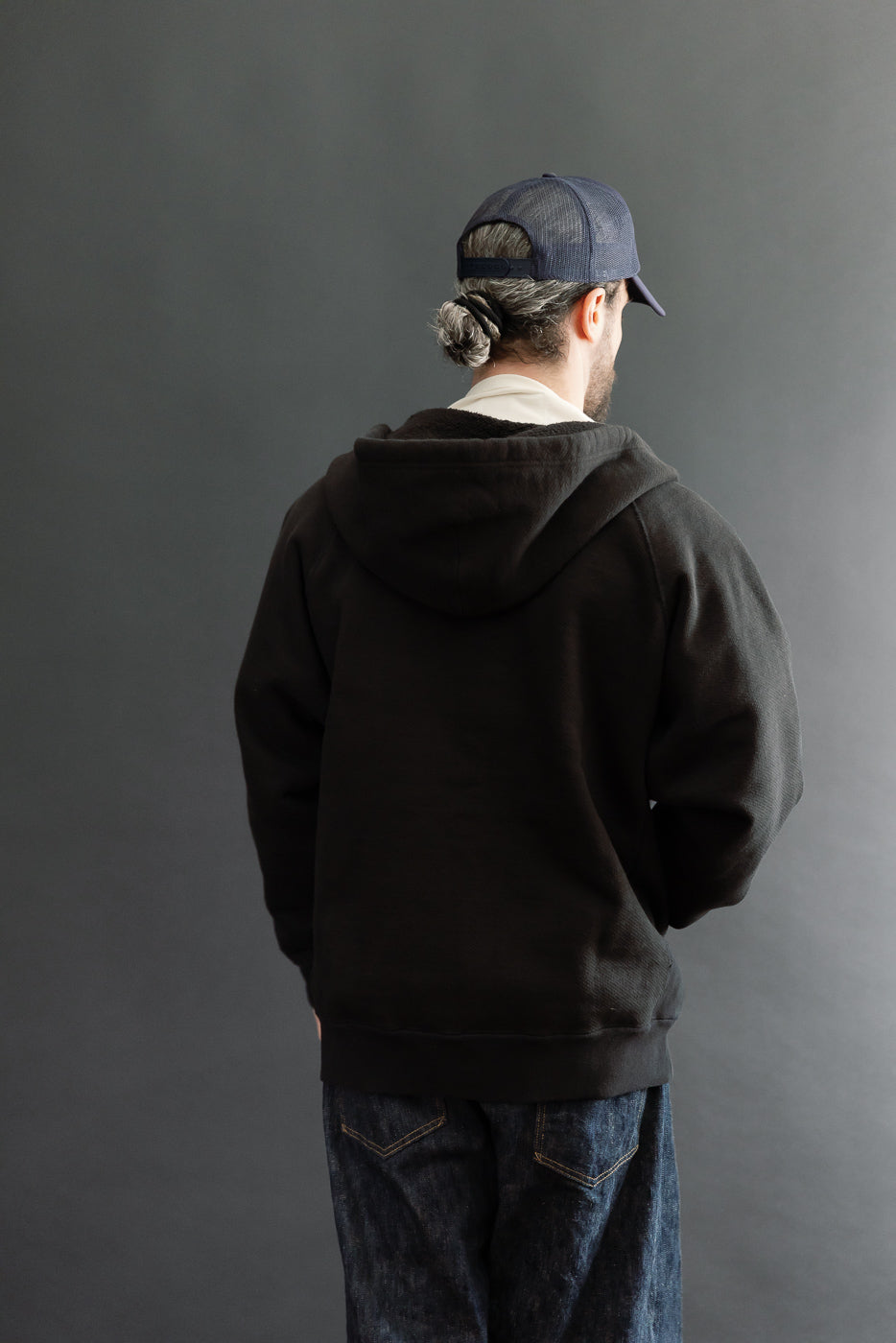 Back view of male model, 5'9