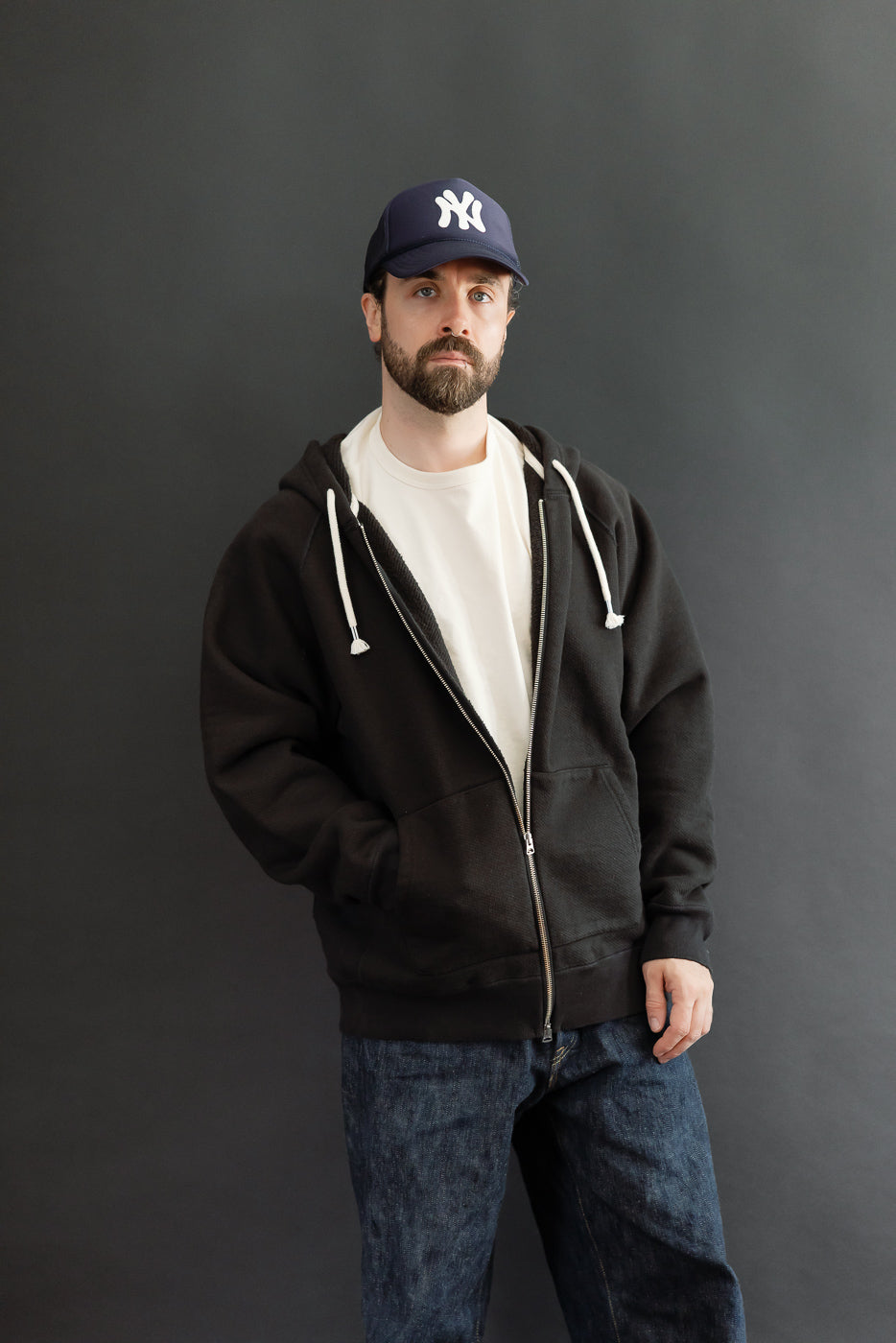 Full body front view of a male model, 5'9