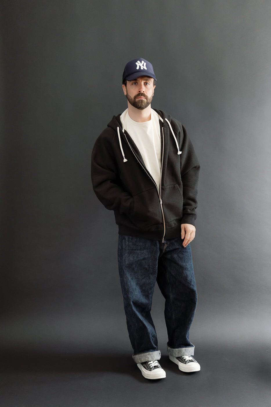 Full body front view of a male model, 5'9