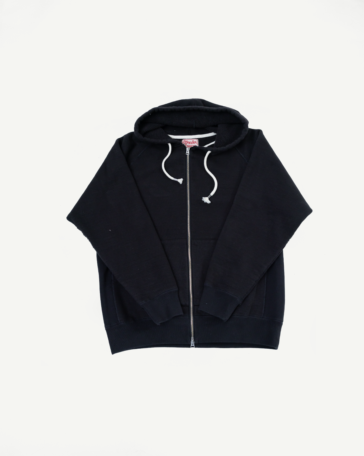 Front view flat lay of a black zip-up hoodie with white drawstrings.