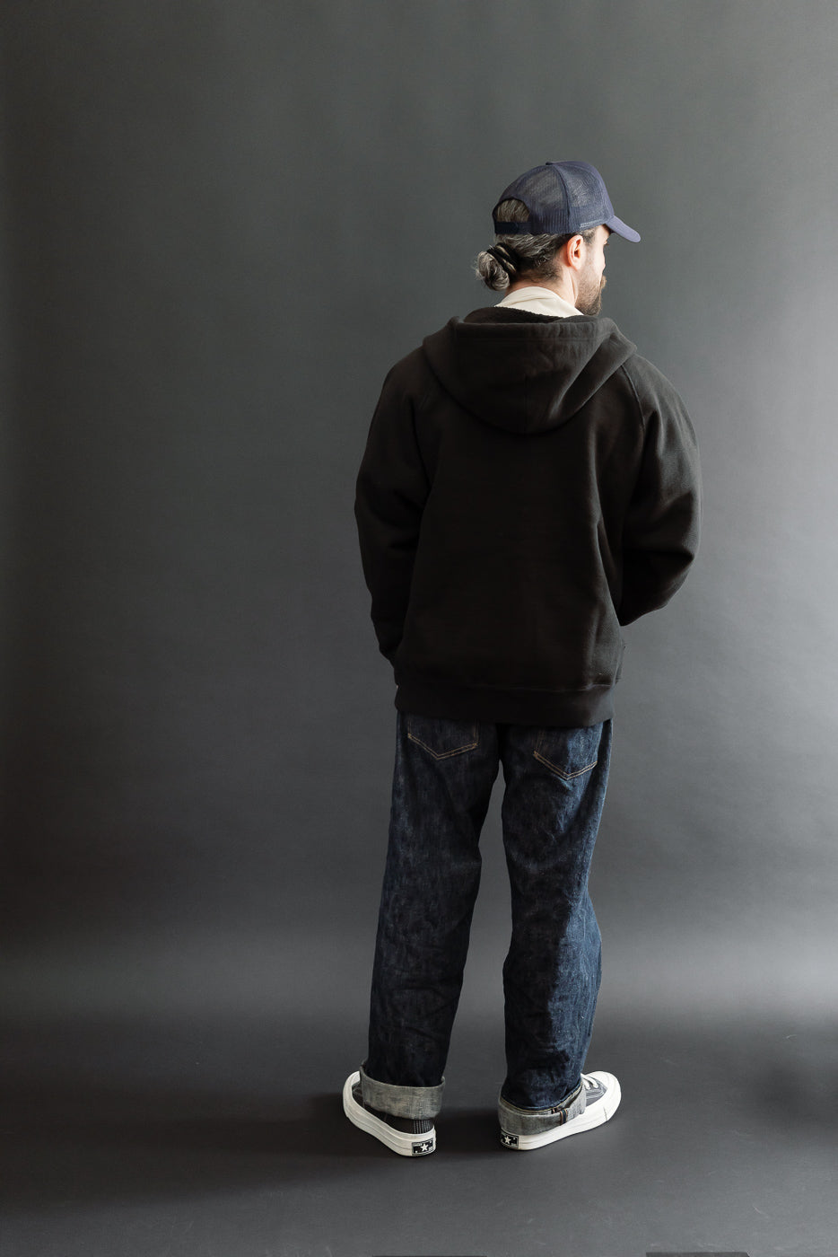 Full body back view of a male model, 5'9