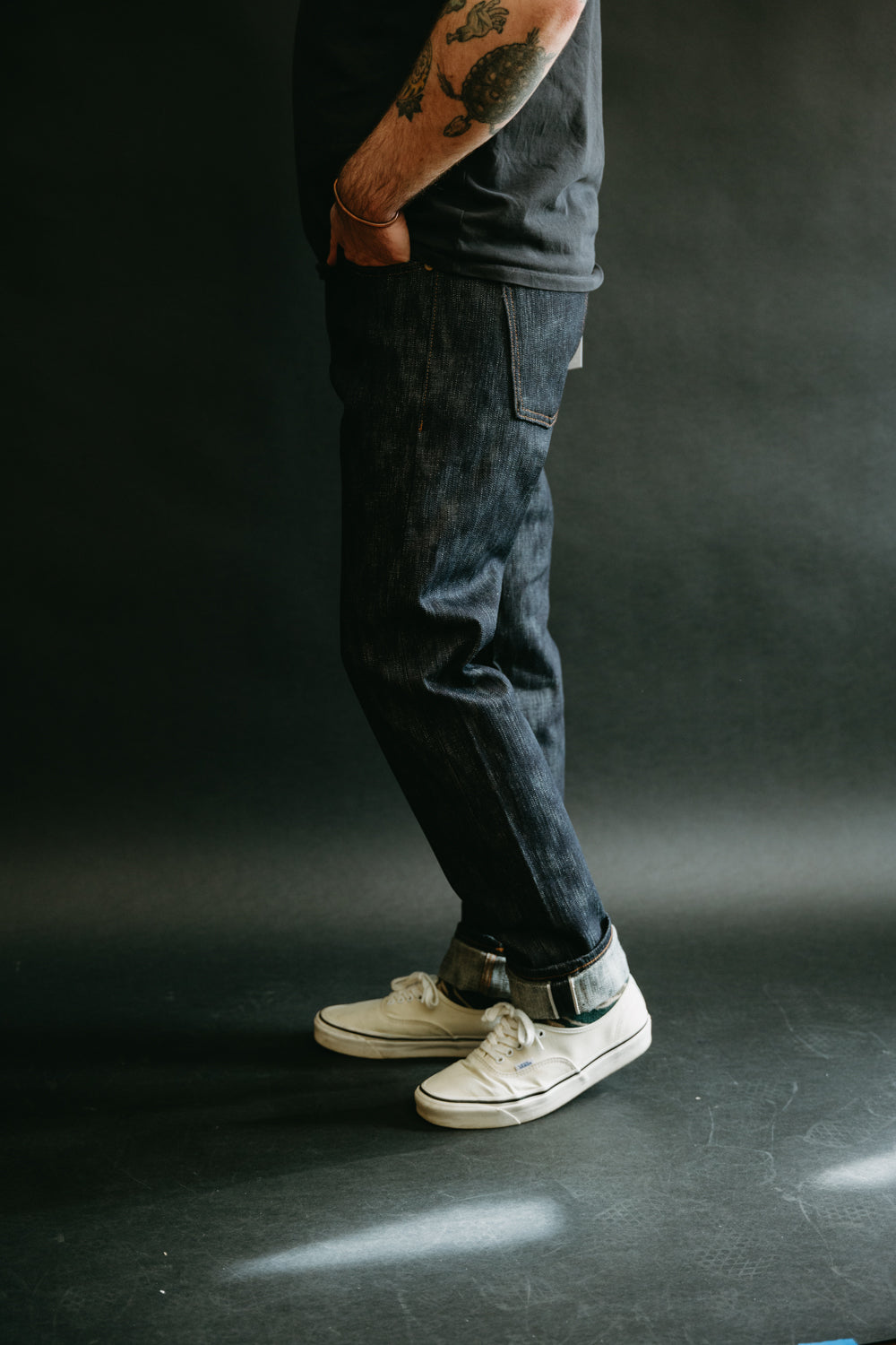 Side view close-up of 18oz Big Slub Selvedge jeans on male model, 5'9