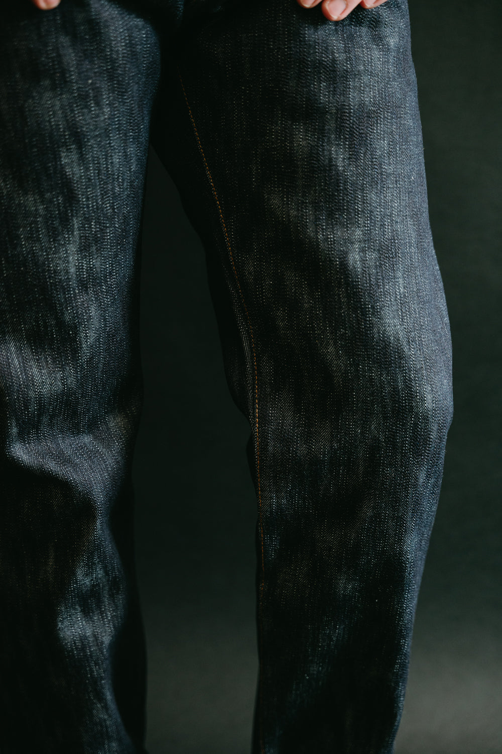 Close-up of male model’s front upper legs in Naked and Famous 18oz Big Slub Selvedge denim jeans